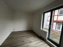 Wohnzimmer VERKAUF: 2-Raumwohnung im Stadtzentrum